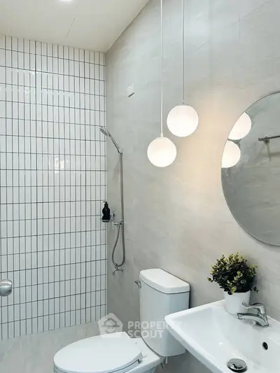 Modern bathroom with elegant lighting and sleek fixtures