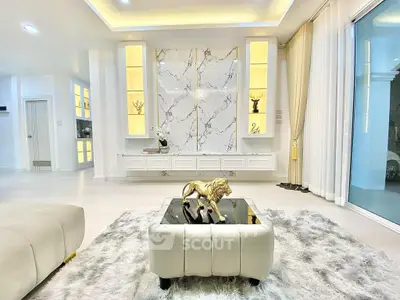 Luxurious living room with elegant decor and marble accents