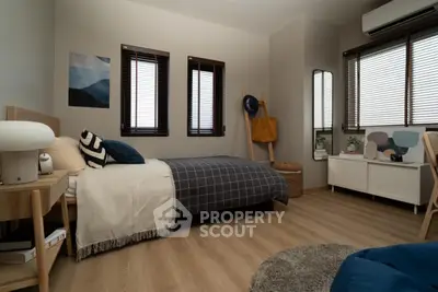 Modern cozy bedroom with stylish decor and natural light