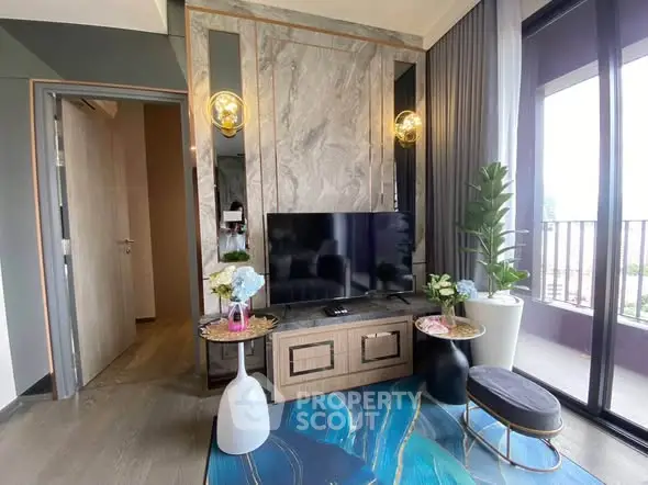 Stylish modern living room with elegant decor and large balcony access.