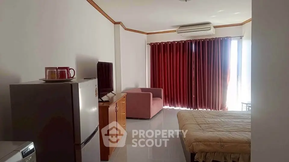 Spacious studio apartment with modern furnishings and natural light