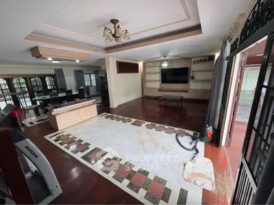 Spacious living room with hardwood floors and modern decor
