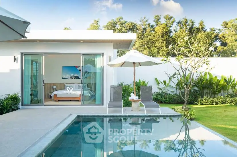 Luxurious villa with private pool and garden, featuring modern design and serene ambiance.