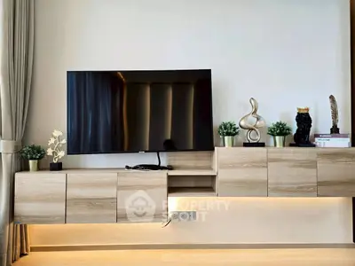 Modern living room with sleek TV setup and stylish decor