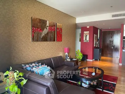 Stylish living room with modern decor and leather sofa in a cozy apartment.