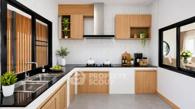 Modern kitchen with sleek design, featuring wooden cabinets, black countertops, and stainless steel appliances.
