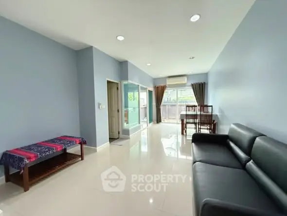 Spacious living room with modern furniture and natural light