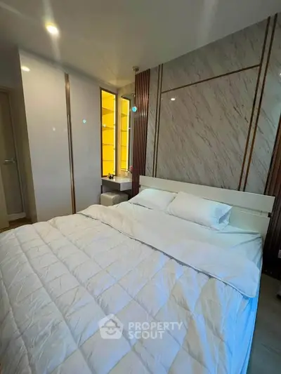 Modern bedroom with stylish decor and cozy ambiance