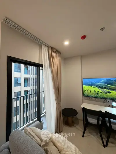 Modern living room with balcony view in urban apartment