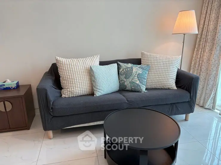 Cozy living room with stylish sofa and modern decor