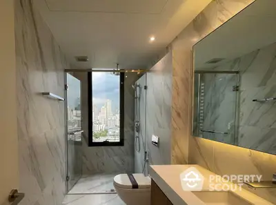 Luxurious bathroom with city view, modern fixtures, and elegant marble design.