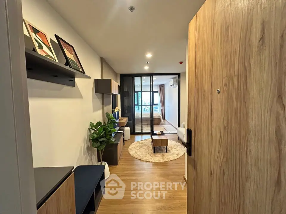 Modern living room with wooden flooring and stylish decor