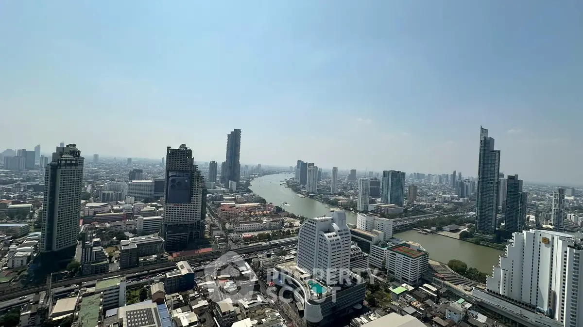 Stunning panoramic cityscape view with river and skyscrapers, ideal for urban living enthusiasts.