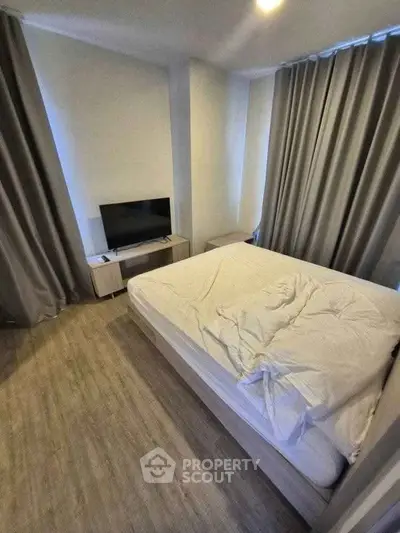 Cozy bedroom with modern decor and natural light