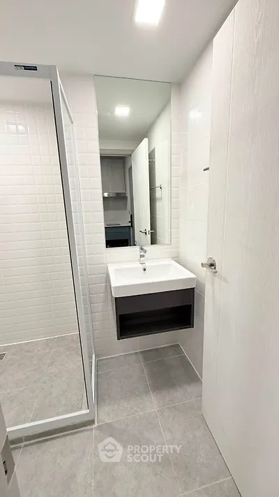 Modern bathroom with sleek design and spacious shower area