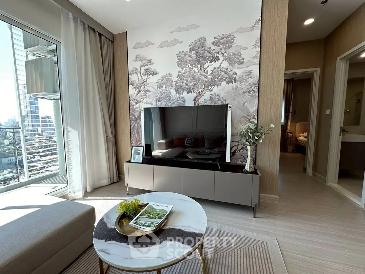 Modern living room with stylish decor and city view, featuring elegant furniture and natural light.