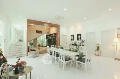 Spacious modern dining room with elegant decor and ample natural light