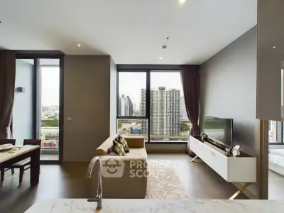 Modern living room with city view, featuring stylish furniture and large windows for natural light.