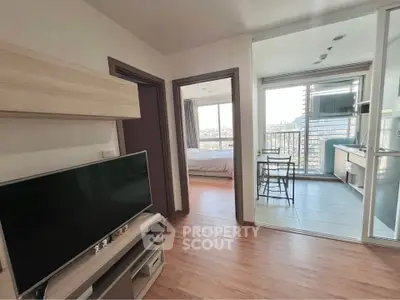 Modern apartment interior with living room, bedroom, and balcony view