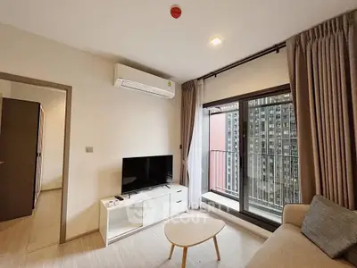 Modern living room with balcony view in urban apartment