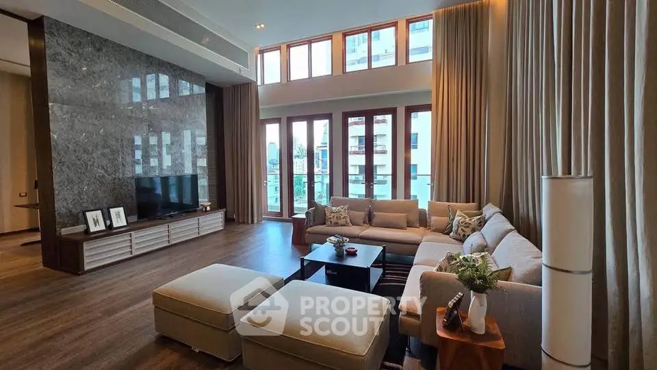 Luxurious living room with high ceilings and elegant decor in modern apartment