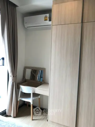 Cozy bedroom corner with built-in wardrobe and study desk