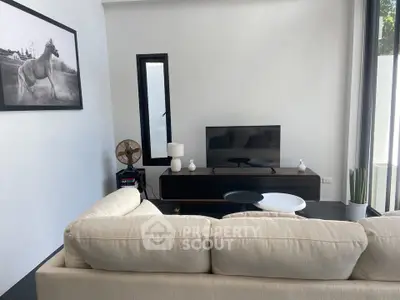 Modern living room with sleek TV setup and stylish decor