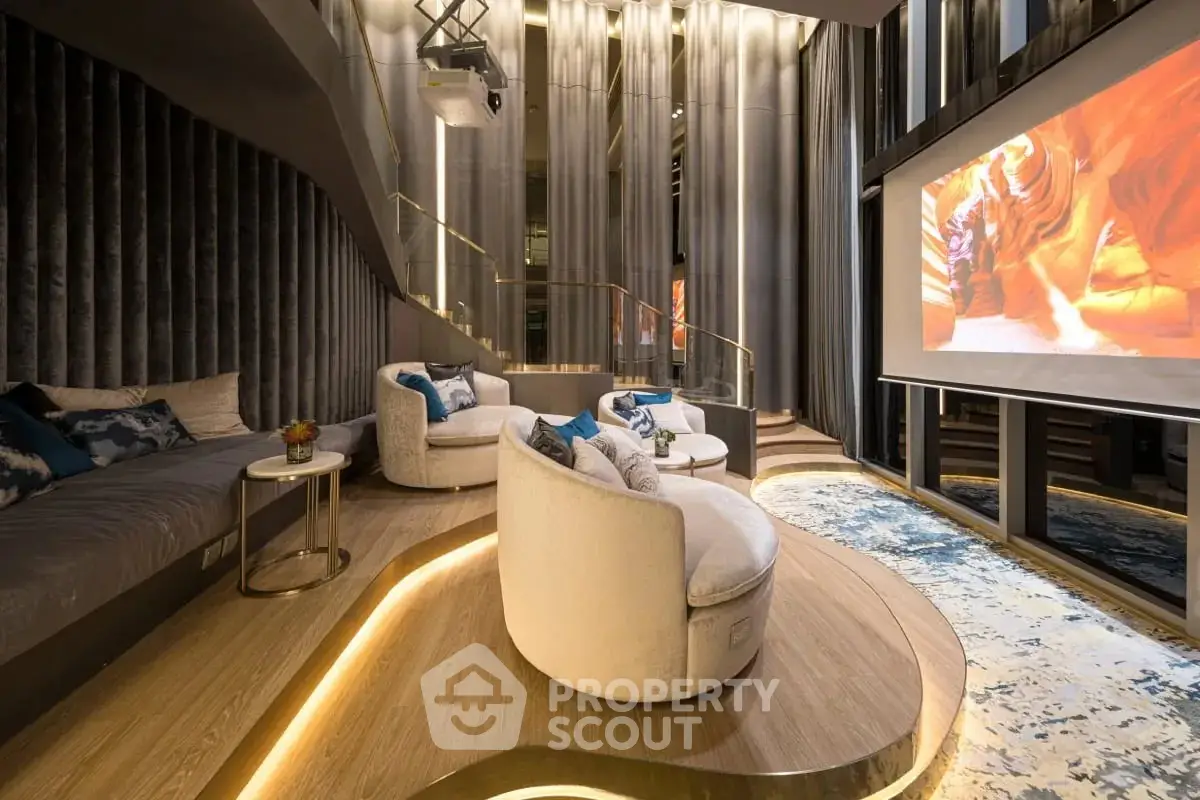 Luxurious home theater with plush seating and ambient lighting for ultimate entertainment experience.