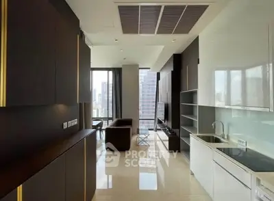Luxurious modern living room with sleek kitchen and stunning city view