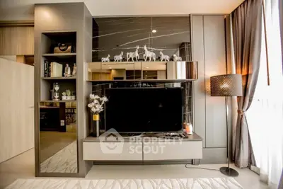 Luxurious living room with modern TV unit and elegant decor