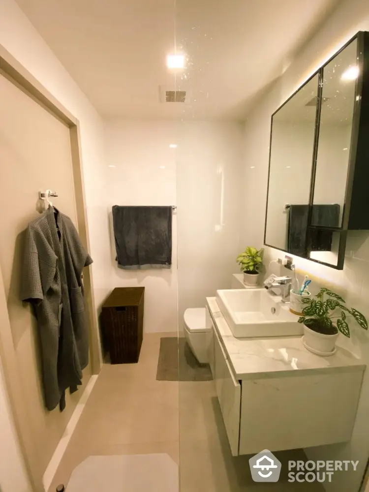 Modern bathroom with sleek vanity and stylish decor