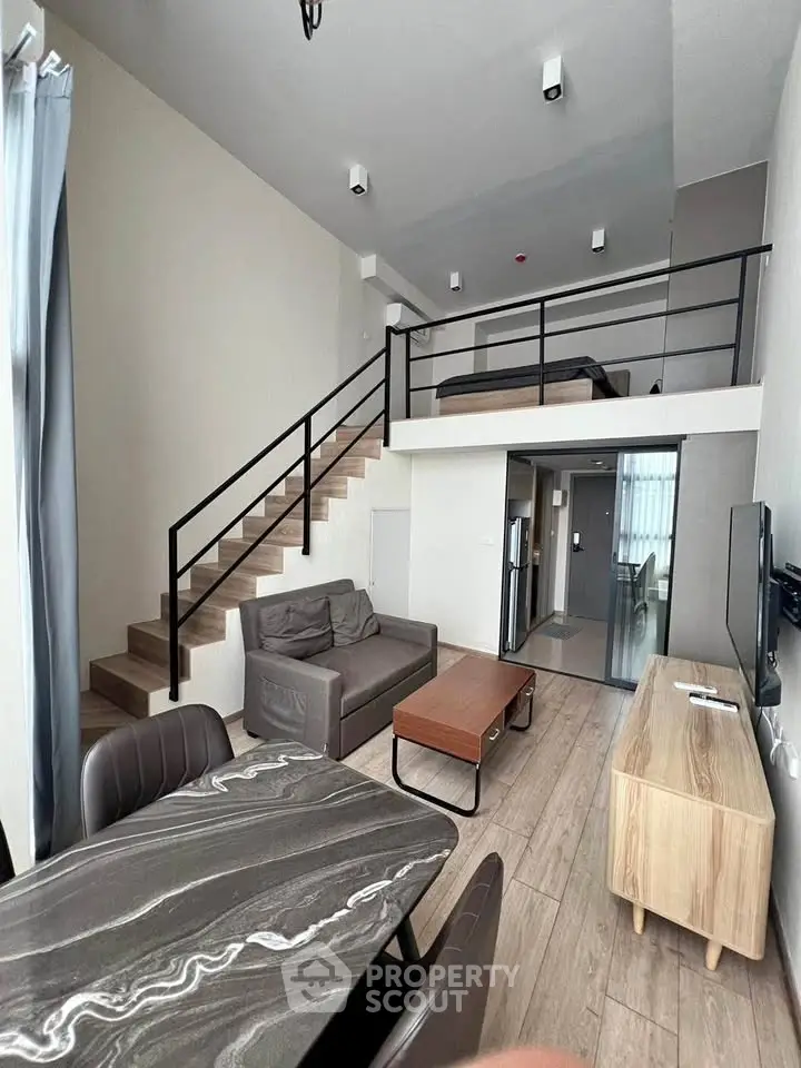 Modern loft apartment with mezzanine bedroom and stylish living area