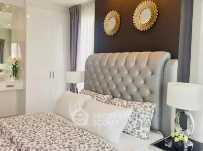 Luxurious bedroom with elegant decor and plush bedding in modern apartment