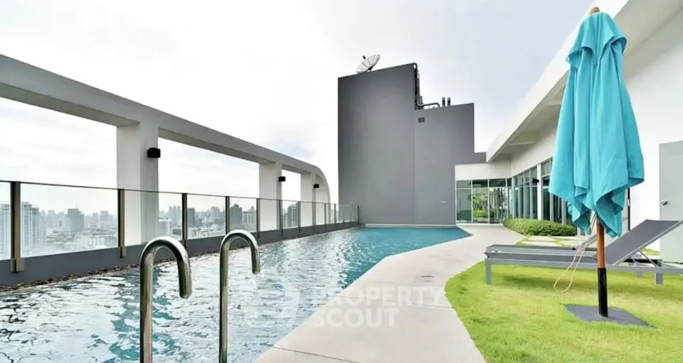 Luxurious rooftop pool with city view and modern amenities