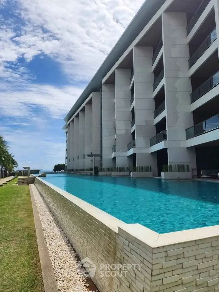 Luxurious modern building with stunning infinity pool and ocean view