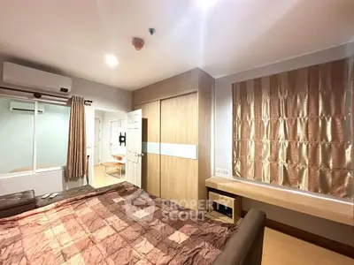 Spacious bedroom with modern decor and ample natural light