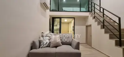 Modern loft apartment with mezzanine bedroom and stylish living area