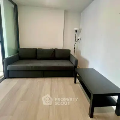 Cozy living room with modern sofa and sleek coffee table