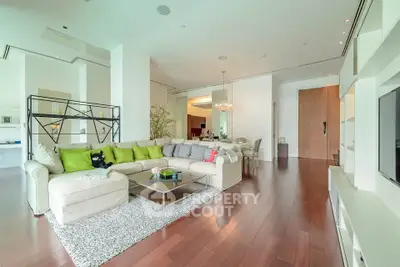 Spacious modern living room with elegant decor and hardwood floors