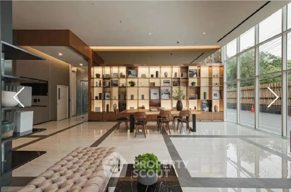 Luxurious modern living room with elegant decor and floor-to-ceiling windows