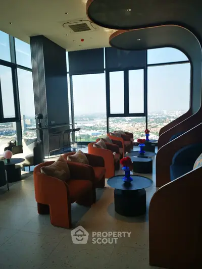 Luxurious high-rise lounge with panoramic city views and modern seating
