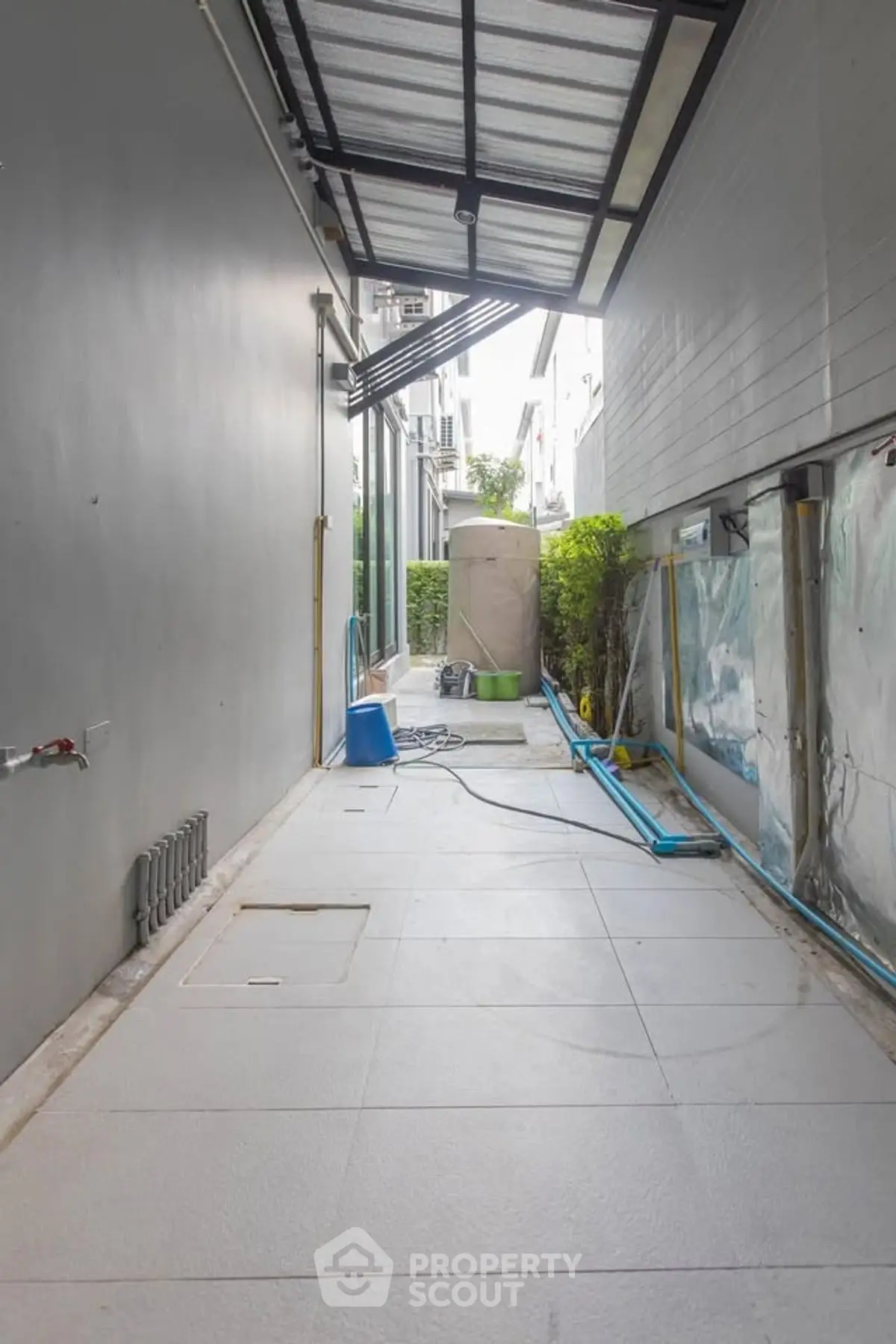 Spacious outdoor utility area with modern design and ample storage space.