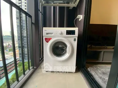 Modern balcony with washing machine and city view, perfect for urban living.