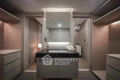 Luxurious modern bathroom with sleek vanity and ambient lighting