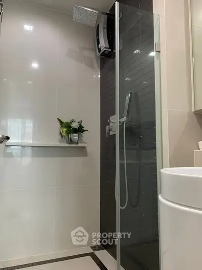 Modern bathroom with glass shower and sleek design