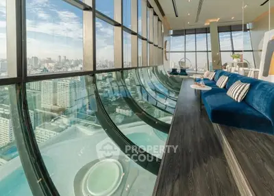 Luxurious high-rise living room with panoramic city views and modern design