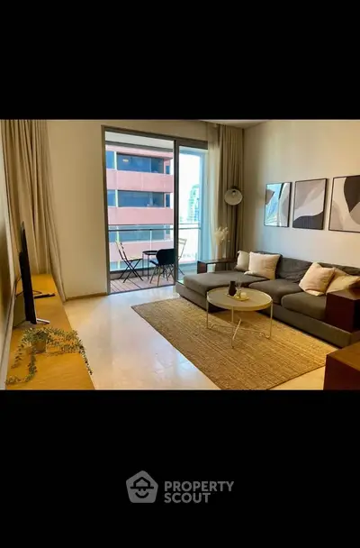 Modern living room with balcony view and stylish decor