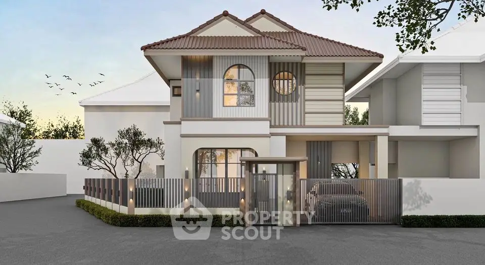 Modern two-story house with sleek design and gated entrance