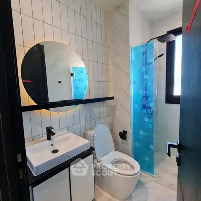 Modern bathroom with sleek fixtures and stylish shower design