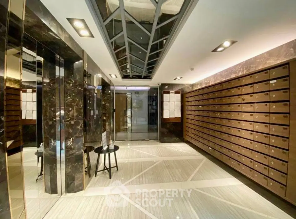 Luxurious building lobby with elegant mailboxes and marble finishes